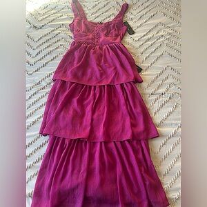 Brand new! Bustier top, dress has some shine and beautiful tiered length